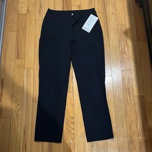 Lululemon women’s black on the move pant. Size 4. New with tags.